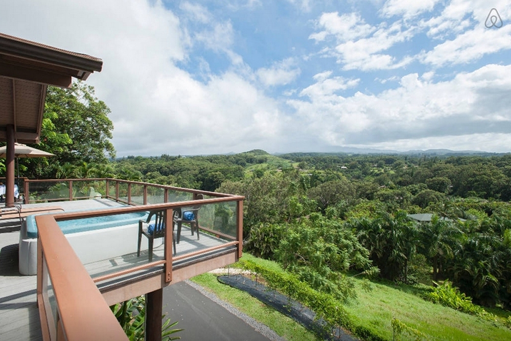 The deck offers a view of the volcano, rainforest and ocean